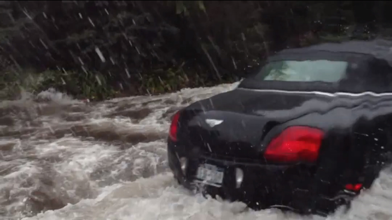 Illustration for article titled Watch A Couple Bros Destroy Their Bentley In Sandy's Flooding